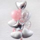Фонтан из розовых шаров с белыми и серебряными сердцами