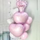Композиция из розовых шаров с большим сердцами и Ножкой