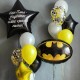 Композиция из серых, желтых и черных шаров с эмблемой Бэтмена
