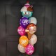 Фонтан из разноцветных шаров с фигурами Мороженое