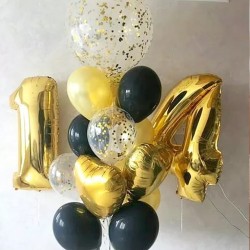 Фонтан из черно-золотых шаров с большим шаром и цифрой 14