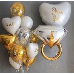 Фонтан из золотых шаров с конфетти на свадьбу