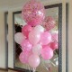 Фонтан из розовых шаров и большой шар с конфетти