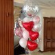 Фонтан из красных сердец с белыми шарами и шар с конфетти