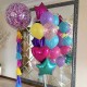 фонтан из разноцветных шаров и большой шар с конфетти