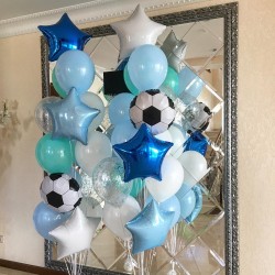 Фонтан из белых, голубых и синих звезд с футбольными мячами