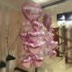 Фонтан из фольгированных розовых сердец и шарами с конфетти