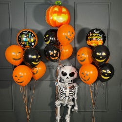 Композиция на Хэллоуин со скелетом и фонтанами с тыквами
