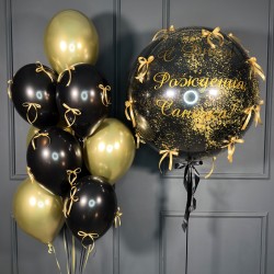 Сет из черных и золотых шаров с большим шаром с бантиками 