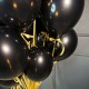 Черные шарики на золотых лентах с бантиками