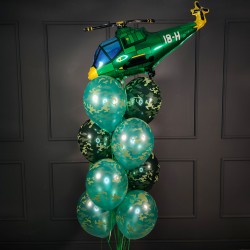 Фонтан из камуфляжных шаров с зеленым Вертолетом