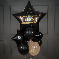 Фонтан из черных шаров и большой звездой с надписью