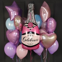 Композиция из пастельных шаров с розовой бутылкой шампанского