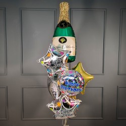 Фонтан из фольгированных звезд с фигурой бутылкой шампанского