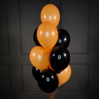 Фонтан из черных и оранжевых шаров пастель